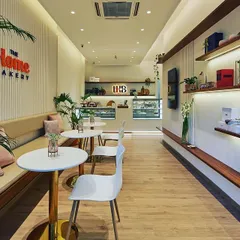 For The Home Bakery, we merged two distinct ideas: the baker's desire for a contemporary minimalist haven and the brand's warm, homely feel. The result is a welcoming space that feels both modern and deeply comforting.