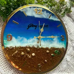 A full view of the custom resin wall clock created for Godrej Agrovet. The design beautifully blends the ocean theme with the company's product, creating a unique and meaningful corporate gift.