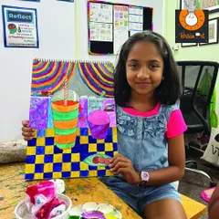 This vibrant and imaginative still life was created by a young artist in our class. We encourage kids to play with color and perspective.