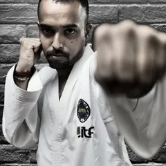 A close up of a straight punch. This fundamental move is all about generating power from the entire body, not just the arm, to deliver a focused and effective strike.
