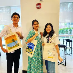 More happy faces from a tote bag painting session. It's a fun, practical, and creative activity for any group gathering.