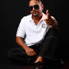 A studio shot where I'm pointing at you, the audience. It's all about making that connection.