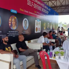 Our coaches sitting on the panel during the two-day MMA for Self-Defense workshop, recognized by AIMMAA.