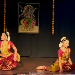 A moment of perfect synchronicity during a duet performance for World Dance Day. Dancing with a partner brings a unique dynamic of contrast and connection to the stage.