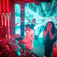 That priceless reaction. A fan is completely starstruck as I get on the mic at FLO, a perfect candid moment showing the personal connection I build during my sets.