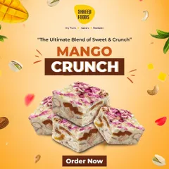 The Mango Crunch is a modern sweet I offer. It's a barfi-style sweet made with a milky base, loaded with crunchy nuts, and topped with dried rose petals for a beautiful finish and aroma.