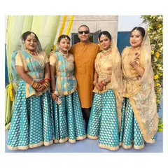 Our team of talented folk dancers posing with a happy client after a successful event. We are proud to bring traditional Indian culture to celebrations.