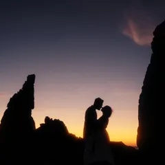 A perfect end to a day of shooting in Goa. We captured this stunning silhouette of the couple against the vibrant colors of the sunset, creating a timeless and romantic image that speaks volumes without saying a word.