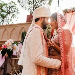 Bathed in the golden light of the sun, this is a moment of pure connection. I look for those quiet pauses between the big events to capture the love that shines brightest when it's just the two of you.