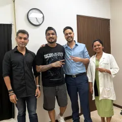The full team with DIVINE at the clinic. We are all committed to providing a comfortable and professional experience for every person who walks through our doors.