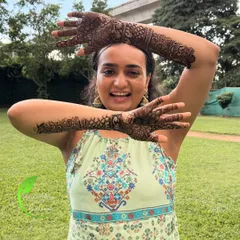 The pure joy of a bride showing off her freshly done mehendi. It's moments like these that I cherish.