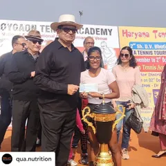 Here is my client Sandeepti Singh Rao receiving her winner's prize. Supporting a young tennis athlete's journey involves creating a diet plan that evolves with their training load and competition schedule, focusing on sustained energy and optimal recovery.
