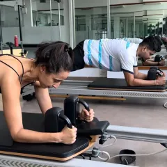 Here, cricketer Shreyas Iyer and I work on a Reformer plank, a fantastic exercise for building core endurance. For athletes, a strong core is the key to generating power and preventing injuries during explosive movements.