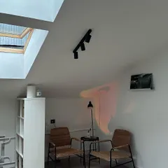 Our cozy space in detail. The skylights bring in beautiful natural light, creating a serene and airy atmosphere.