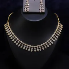 Unique caption for media id 156 describing the specific jewellery and look.