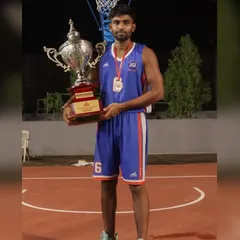 Holding the runner-up trophy from the Dr. N Mahalingam Trophy tournament. A tough competition that made us stronger.