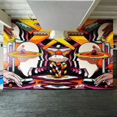 A full view of the large-scale mural I designed and executed for the Rippling office in Bangalore. This piece visualizes the concept of a "ripple effect," celebrating human-centric customer support through a surreal, cosmic landscape. I manage mural projects from the initial digital design to overseeing the on-site painting.