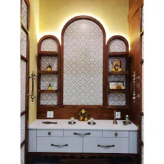 A sacred space for prayer and reflection, this custom pooja room is a testament to intricate craftsmanship. Featuring ornate jaali work, warm ambient lighting, and dedicated storage, we designed this space to be a tranquil sanctuary within the home.