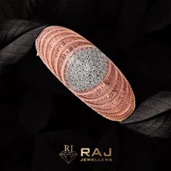 A testament to modern luxury, this rose gold bracelet features a stunning centerpiece of clustered CZ stones, creating a brilliant floral effect. The intricate design and warm tones make it a sophisticated statement of style.