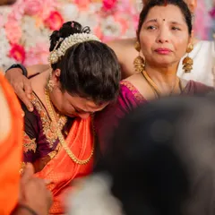 A quiet, emotional moment during the ceremony. The makeup remains flawless, even through tears.