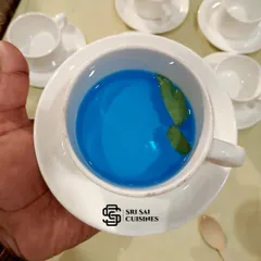 This is my Angel Tea, a naturally blue tea made from butterfly pea flowers. It has a subtle flavor and a stunning color that always surprises and delights guests.