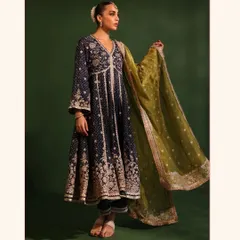 This is elegance, bottled. My Rangeela Banarsi Navy Anarkali is for when you want to make an entrance. The rich navy blue fabric paired with the contrasting olive green organza dupatta is perfect for a wedding reception or a formal evening event.