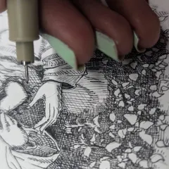 A close up, in-progress shot of the Jesus illustration, showing the fine tip of the micron pen as I build up the texture of the leaves with careful strokes.
