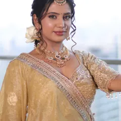 This close up shows the flawless, dewy finish of the makeup. The soft glam style enhances her features naturally, creating a timeless and elegant bridal look.