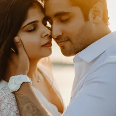 In the warm embrace of the golden hour, a moment of pure, quiet connection. This intimate close-up captures the gentle touch and serene love that I strive to find in every pre-wedding beach shoot.
