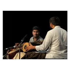 A candid moment of interaction with my co-artist during the Ranjani Memorial Concert. The silent communication between musicians on stage is a beautiful part of the performance.