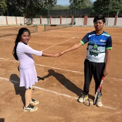 Another display of good sportsmanship at the conclusion of a match. These tournaments are crucial for learning how to compete.