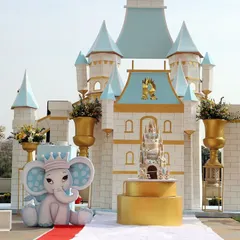 The centrepiece of this Winter Wonderland party was a magnificent custom-built castle. Paired with a cute baby elephant prop and a giant number '1', it created a breathtaking focal point for a prince's first birthday.