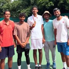 The team behind the champion. Celebrating with Lakshmi Jadala after his incredible gold medal win at the National Tennis Championship. His journey of breaking barriers and showing limitless determination makes our whole academy proud.