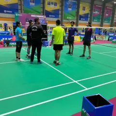 Briefing the players before a crucial match at the nationals. We discuss the game plan, opponent's weaknesses, and key strategies to focus on.
