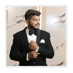 Dapper looks without the commitment. Our client looks ready for his reception in this classic black tuxedo with a bow tie.
