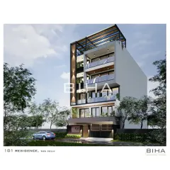 An alternative perspective of the 101 Residence, showcasing the extensive use of glass railings and large windows to maximize natural light and create a connection between the interior and exterior spaces.