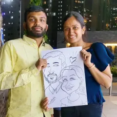 This couple was thrilled with their caricature. Capturing shared joy is one of my favorite things to do.