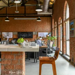 Raw brick in our studio, The Loft. No paint, no pretense. Just honest, tactile warmth that catches the morning light. This is exactly why we love it.