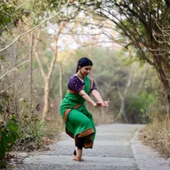 A full-body shot from my photoshoot in the woods, capturing a classic Bharatanatyam pose. The natural setting provides a serene backdrop to the dance form's inherent grace.