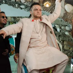 The groom's energetic entrance on a dhol is a perfect example of the fun and excitement we capture. It's these high-energy, candid moments that make a wedding celebration so memorable.