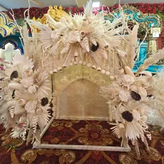A modern and earthy take on festive decor. This boho-style mandap uses a variety of dried natural elements to create a unique and artistic setting.