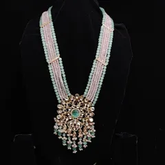 A unique combination of pastel pink and mint green beads makes this long necklace a standout piece. Rent it for your mehendi or sangeet for a fun, colourful look.