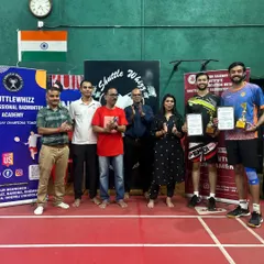 Two of our top performers from the adult category with their trophies and certificates. Their success is a testament to consistent practice and the high level of play within our academy.