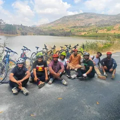 The whole group together after a fantastic ride in the Nandi countryside. The smiles and camaraderie are what it's all about.