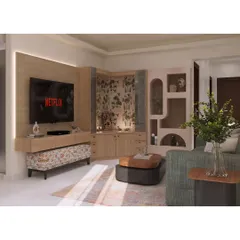In this layout, we seamlessly integrated a corner pooja unit with the TV console. The use of consistent wood tones and a subtle wallpaper in the mandir creates a cohesive look for the entire living space.