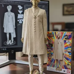 We bring your vision to life, from the initial digital sketch to the final masterpiece. This image shows the journey of a classic ivory sherwani, complete with a matching safa (turban), stole, and juttis, transformed from a 3D model into a collectible-worthy creation.