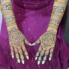 For the bride who loves classic beauty, a full bridal mehendi with intricate patterns and perfect symmetry. I focus on fine lines and a balanced design that covers the hands and arms beautifully.