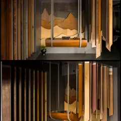 A key feature of the showroom is this suspended desk and artistic backdrop, both crafted from veneer. This sculptural installation demonstrates the material's versatility and creates a stunning focal point.
