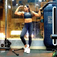 A front relaxed pose in the gym. Even in a "relaxed" stance, a competitor needs to show their physique, and I teach you how to hold this pose correctly.