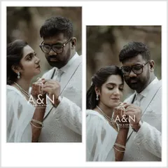 A tender moment between the newly engaged couple, showing their rings. The soft, natural background keeps the focus entirely on their connection.